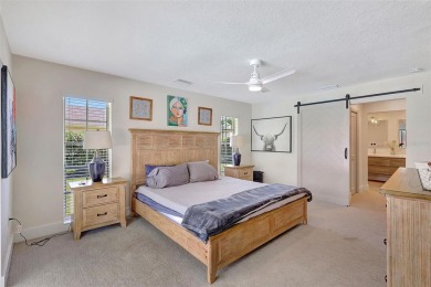 This beautifully maintained 3-bedroom, 2-bath pool home is on Palm Aire Country Club of Sarasota in Florida - for sale on GolfHomes.com, golf home, golf lot