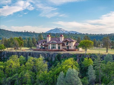 Passing through a custom lava rock gated entry to the impressive on Fall River Valley Golf and Country Club in California - for sale on GolfHomes.com, golf home, golf lot