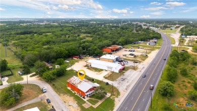 This prime commercial property, strategically located on N on Luling Golf Club in Texas - for sale on GolfHomes.com, golf home, golf lot