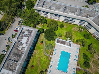 Motivated Seller!  Beautifully updated 2-bed, 2-bath corner unit on Wynmoor Golf Course in Florida - for sale on GolfHomes.com, golf home, golf lot