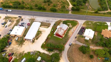 This prime commercial property, strategically located on N on Luling Golf Club in Texas - for sale on GolfHomes.com, golf home, golf lot