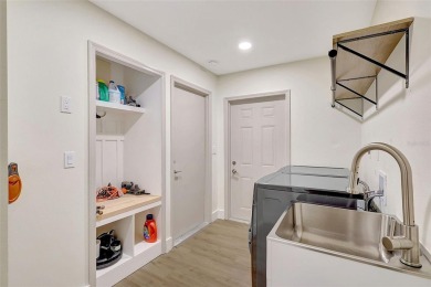 This beautifully maintained 3-bedroom, 2-bath pool home is on Palm Aire Country Club of Sarasota in Florida - for sale on GolfHomes.com, golf home, golf lot