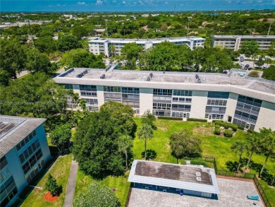 Motivated Seller!  Beautifully updated 2-bed, 2-bath corner unit on Wynmoor Golf Course in Florida - for sale on GolfHomes.com, golf home, golf lot