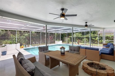 This beautifully maintained 3-bedroom, 2-bath pool home is on Palm Aire Country Club of Sarasota in Florida - for sale on GolfHomes.com, golf home, golf lot
