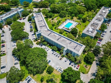Motivated Seller!  Beautifully updated 2-bed, 2-bath corner unit on Wynmoor Golf Course in Florida - for sale on GolfHomes.com, golf home, golf lot