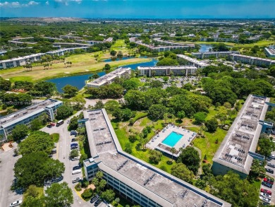 Motivated Seller!  Beautifully updated 2-bed, 2-bath corner unit on Wynmoor Golf Course in Florida - for sale on GolfHomes.com, golf home, golf lot