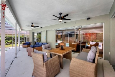 This beautifully maintained 3-bedroom, 2-bath pool home is on Palm Aire Country Club of Sarasota in Florida - for sale on GolfHomes.com, golf home, golf lot