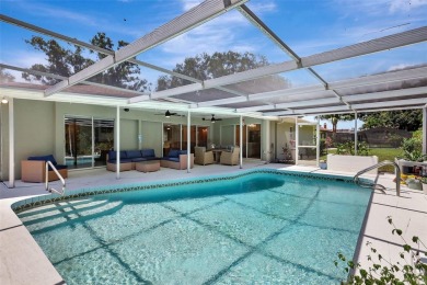 This beautifully maintained 3-bedroom, 2-bath pool home is on Palm Aire Country Club of Sarasota in Florida - for sale on GolfHomes.com, golf home, golf lot