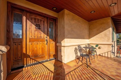 Passing through a custom lava rock gated entry to the impressive on Fall River Valley Golf and Country Club in California - for sale on GolfHomes.com, golf home, golf lot