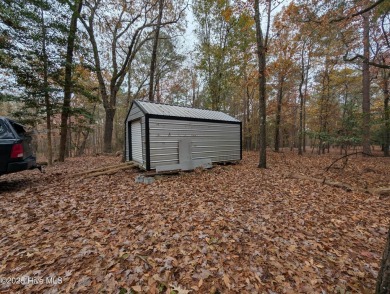 This beautiful, high elevation & fully fenced in lot is located on Minnesott Golf and Country Club in North Carolina - for sale on GolfHomes.com, golf home, golf lot