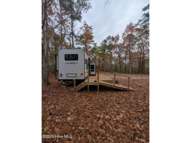 This beautiful, high elevation & fully fenced in lot is located on Minnesott Golf and Country Club in North Carolina - for sale on GolfHomes.com, golf home, golf lot