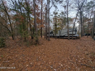 This beautiful, high elevation & fully fenced in lot is located on Minnesott Golf and Country Club in North Carolina - for sale on GolfHomes.com, golf home, golf lot