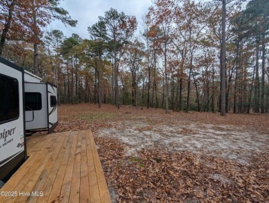 This beautiful, high elevation & fully fenced in lot is located on Minnesott Golf and Country Club in North Carolina - for sale on GolfHomes.com, golf home, golf lot