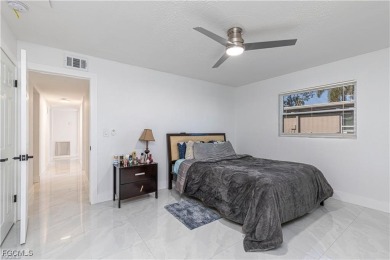 This gorgeous 4 bedroom, 2 bath pool home in the historic Palm on Fort Myers Country Club in Florida - for sale on GolfHomes.com, golf home, golf lot
