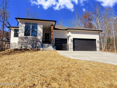 This stunning 3-bedroom, 2.5-bath Prairie-style custom home on Druid Hills Golf Club in Tennessee - for sale on GolfHomes.com, golf home, golf lot