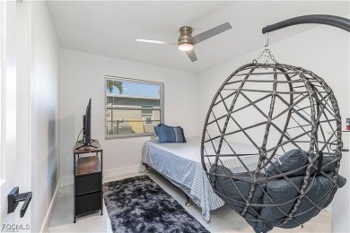 This gorgeous 4 bedroom, 2 bath pool home in the historic Palm on Fort Myers Country Club in Florida - for sale on GolfHomes.com, golf home, golf lot