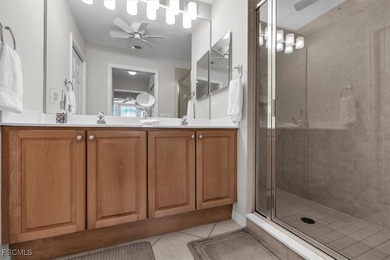 Charming top floor condo with stunning water and golf course on Legends Golf and Country Club in Florida - for sale on GolfHomes.com, golf home, golf lot