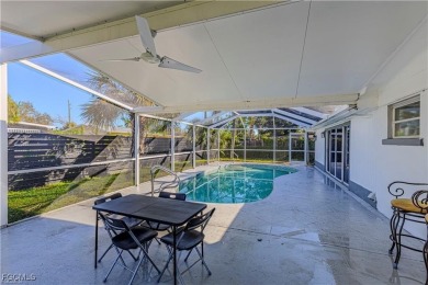 This gorgeous 4 bedroom, 2 bath pool home in the historic Palm on Fort Myers Country Club in Florida - for sale on GolfHomes.com, golf home, golf lot