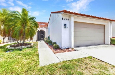 This stunning three-bedroom, two-bath freestanding villa is on Twin Isles Country Club in Florida - for sale on GolfHomes.com, golf home, golf lot