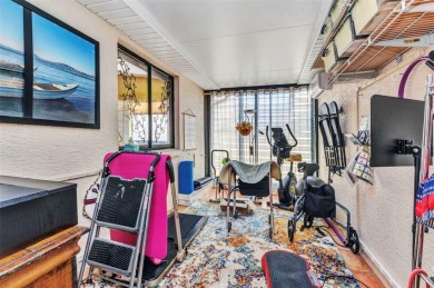 This stunning three-bedroom, two-bath freestanding villa is on Twin Isles Country Club in Florida - for sale on GolfHomes.com, golf home, golf lot