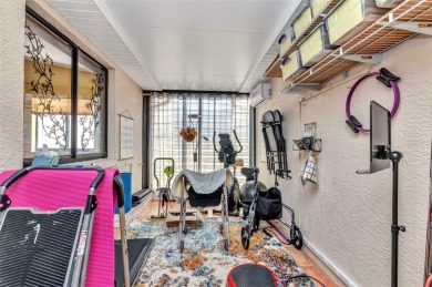 This stunning three-bedroom, two-bath freestanding villa is on Twin Isles Country Club in Florida - for sale on GolfHomes.com, golf home, golf lot