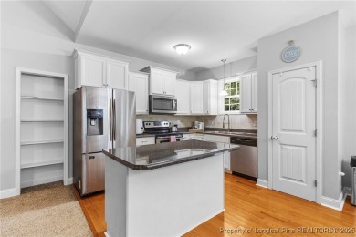 Come tour this spacious 4-bedroom, 2-bathroom single story home on Carolina Trace Country Club in North Carolina - for sale on GolfHomes.com, golf home, golf lot