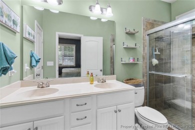 Come tour this spacious 4-bedroom, 2-bathroom single story home on Carolina Trace Country Club in North Carolina - for sale on GolfHomes.com, golf home, golf lot