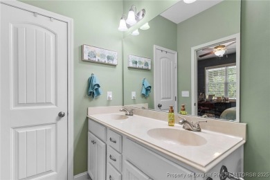 Come tour this spacious 4-bedroom, 2-bathroom single story home on Carolina Trace Country Club in North Carolina - for sale on GolfHomes.com, golf home, golf lot