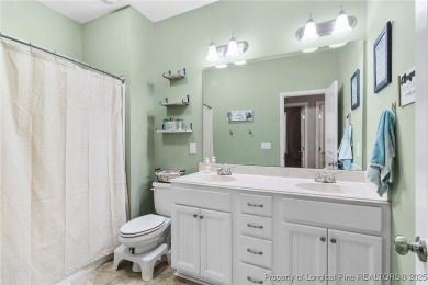 Come tour this spacious 4-bedroom, 2-bathroom single story home on Carolina Trace Country Club in North Carolina - for sale on GolfHomes.com, golf home, golf lot