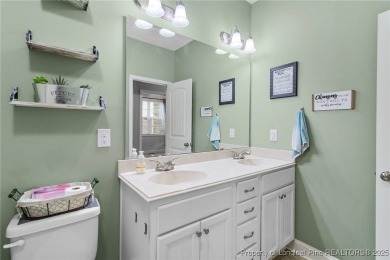 Come tour this spacious 4-bedroom, 2-bathroom single story home on Carolina Trace Country Club in North Carolina - for sale on GolfHomes.com, golf home, golf lot