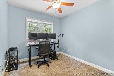 Come tour this spacious 4-bedroom, 2-bathroom single story home on Carolina Trace Country Club in North Carolina - for sale on GolfHomes.com, golf home, golf lot