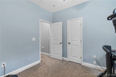 Come tour this spacious 4-bedroom, 2-bathroom single story home on Carolina Trace Country Club in North Carolina - for sale on GolfHomes.com, golf home, golf lot