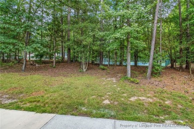 Come tour this spacious 4-bedroom, 2-bathroom single story home on Carolina Trace Country Club in North Carolina - for sale on GolfHomes.com, golf home, golf lot