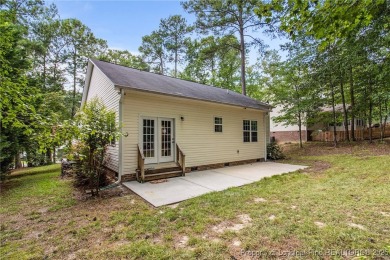 Come tour this spacious 4-bedroom, 2-bathroom single story home on Carolina Trace Country Club in North Carolina - for sale on GolfHomes.com, golf home, golf lot