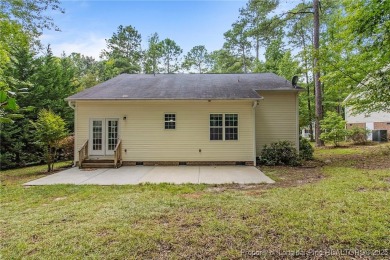 Come tour this spacious 4-bedroom, 2-bathroom single story home on Carolina Trace Country Club in North Carolina - for sale on GolfHomes.com, golf home, golf lot