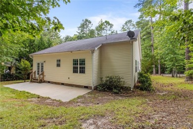 Come tour this spacious 4-bedroom, 2-bathroom single story home on Carolina Trace Country Club in North Carolina - for sale on GolfHomes.com, golf home, golf lot
