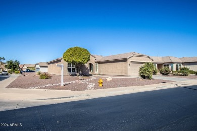 On an OVERSIZED CORNER LOT, this popular floor plan is the on Lone Tree Golf Club in Arizona - for sale on GolfHomes.com, golf home, golf lot