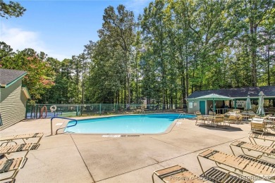 Come tour this spacious 4-bedroom, 2-bathroom single story home on Carolina Trace Country Club in North Carolina - for sale on GolfHomes.com, golf home, golf lot