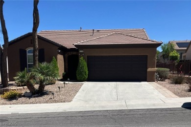Stunning single story home with over $50,000 in upgrades. They on Revere Golf Club in Nevada - for sale on GolfHomes.com, golf home, golf lot