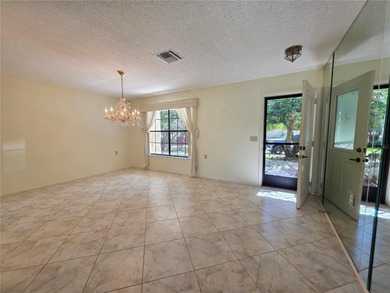 Very spacious end unit villa with beautiful golf course views on Timber Pines Golf Course in Florida - for sale on GolfHomes.com, golf home, golf lot