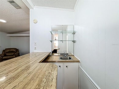 Welcome to this 2-bedroom, 2-bath home in the highly desirable on Imperial Lakewoods Golf Club in Florida - for sale on GolfHomes.com, golf home, golf lot