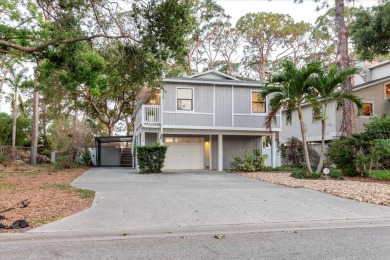 Welcome to this spacious and updated home in Northeast St on Mangrove Bay Golf Course in Florida - for sale on GolfHomes.com, golf home, golf lot