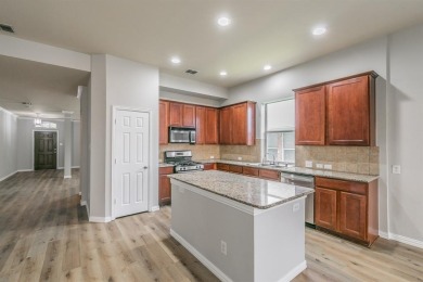 Discover this beautifully updated 4-bedroom, 3.5-bath, 2-story on Woodbridge Golf Club in Texas - for sale on GolfHomes.com, golf home, golf lot