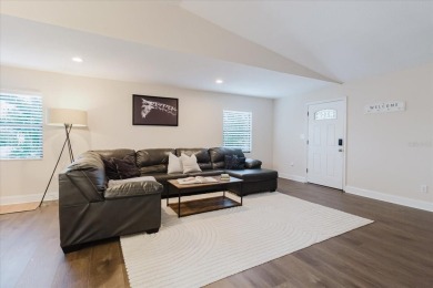 Welcome to this spacious and updated home in Northeast St on Mangrove Bay Golf Course in Florida - for sale on GolfHomes.com, golf home, golf lot
