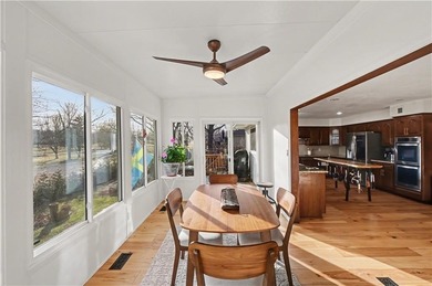 Stunning 1.5-story estate offering 4 bedrooms, 4.1 baths, a 2 on Country Club of Blue Springs in Missouri - for sale on GolfHomes.com, golf home, golf lot