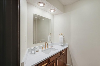 Stunning 1.5-story estate offering 4 bedrooms, 4.1 baths, a 2 on Country Club of Blue Springs in Missouri - for sale on GolfHomes.com, golf home, golf lot