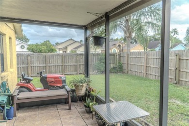 This lovely corner three-bedroom, two-bathroom home is in the on Eastwood Golf Club in Florida - for sale on GolfHomes.com, golf home, golf lot