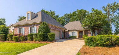 This spacious 4 bedroom, 3 bathroom home is situated in the on Lake Caroline Golf Club in Mississippi - for sale on GolfHomes.com, golf home, golf lot