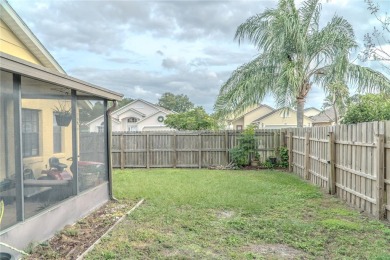 This lovely corner three-bedroom, two-bathroom home is in the on Eastwood Golf Club in Florida - for sale on GolfHomes.com, golf home, golf lot