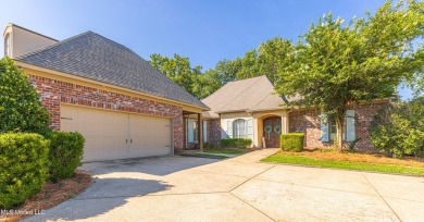 This spacious 4 bedroom, 3 bathroom home is situated in the on Lake Caroline Golf Club in Mississippi - for sale on GolfHomes.com, golf home, golf lot